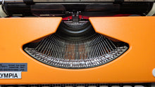 Load image into Gallery viewer, 1977 Olympia Traveler De Luxe (White/Orange)