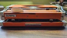 Load image into Gallery viewer, 1977 Olympia Traveler De Luxe (White/Orange)